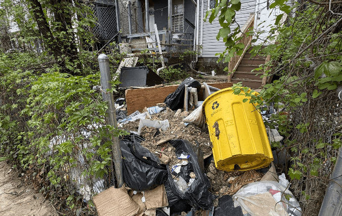 Outdoor cleanup project before Mor Handy property care