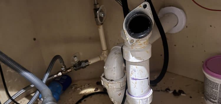 Under-sink plumbing repair area for Mor Handy project