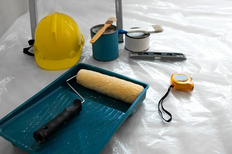 Painting tools and prep materials ready for a professional home painting project